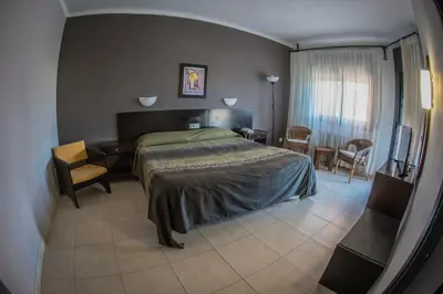 Cama o camas de una habitación en Hotel Gran Sol