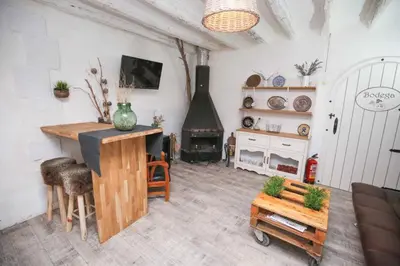Una televisión o centro de entretenimiento en Cabana del Tio Pepe