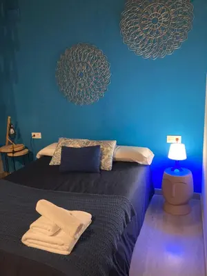 Cama o camas de una habitación en Loteta Experience
