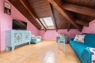 Una televisión o centro de entretenimiento en Casa Dieste Apartamentos Turísticos en Boltaña
