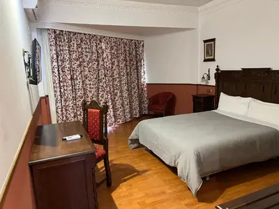 Cama o camas de una habitación en Hotel El Cisne