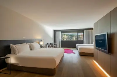 Cama o camas de una habitación en Eurostars Pamplona