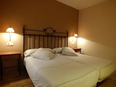 Cama o camas de una habitación en Hotel Areulo