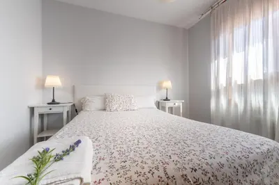 Cama o camas de una habitación en Apartamento Pirineo Aragonés
