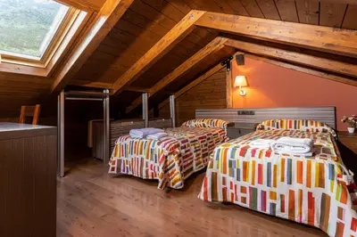 Cama o camas de una habitación en Apartamentos Casa Roldan I