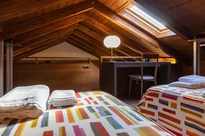 Cama o camas de una habitación en Apartamentos Casa Roldan I