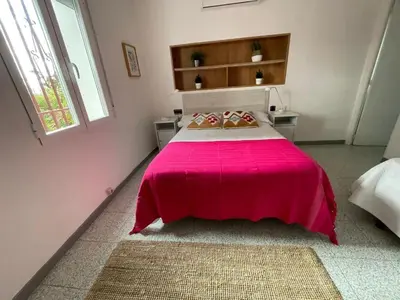 Cama o camas de una habitación en Villa Pachita (por habitaciones)