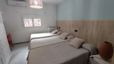 Cama o camas de una habitación en Villa Pachita (por habitaciones)