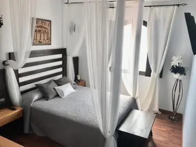 Cama o camas de una habitación en Hotel Castillo Bonavía