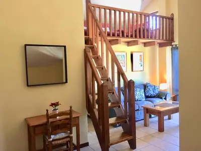 Zona de estar de apartamentos turisticos san juan de la peña