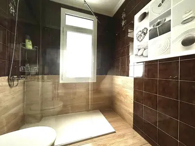 Un baño de Apartamento Tu Sitio