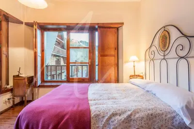 Cama o camas de una habitación en Nin de Beret by SeaMount Rentals