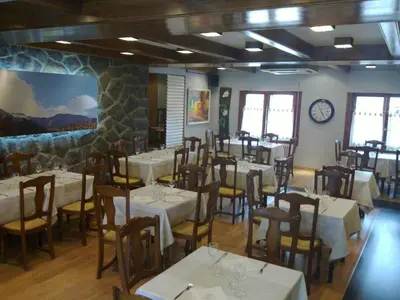Un restaurante o sitio para comer en Hotel Navarro