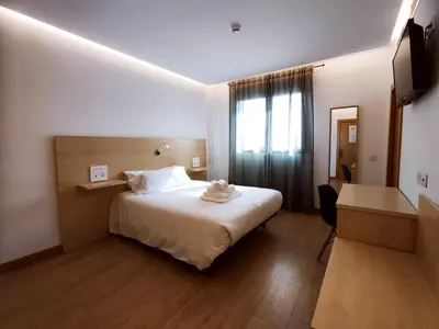 Cama o camas de una habitación en Hotel Casa Marzo