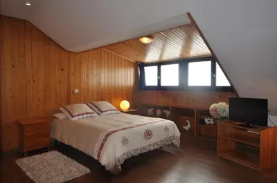 Cama o camas de una habitación en Hotel Tirol