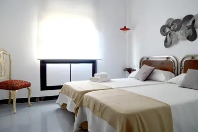 Cama o camas de una habitación en Ohana Apartamento Rural