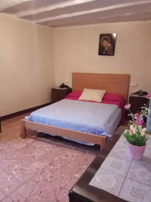 Cama o camas de una habitación en Cal Estevet