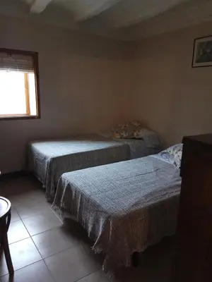 Cama o camas de una habitación en Cal Estevet