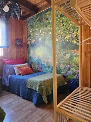 Cama o camas de una habitación en El Jardin de Gala