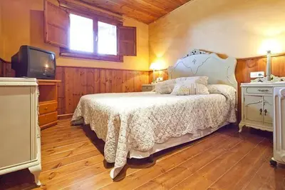 Cama o camas de una habitación en Baqueira 1700 pie de pistas Tanau 4 hab