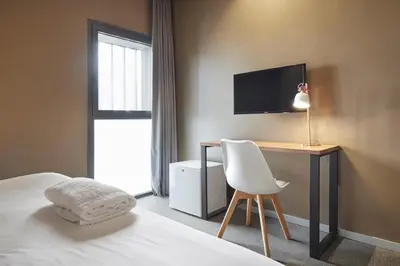Cama o camas de una habitación en Hotel Landaben