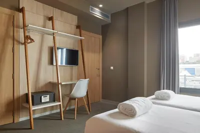 Cama o camas de una habitación en Hotel Landaben