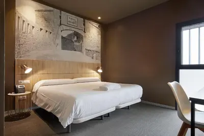 Cama o camas de una habitación en Hotel Landaben