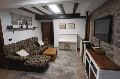 Una televisión o centro de entretenimiento en Casa Martiko