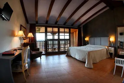 Cama o camas de una habitación en Hotel Villa de Alquézar
