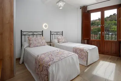 Cama o camas de una habitación en El Portal de Alquezar