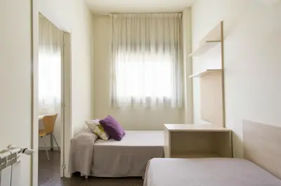 Cama o camas de una habitación en Residencia Universitaria Resa Los Abedules