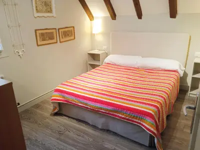 Cama o camas de una habitación en Apartamentos 3000 Escarrilla