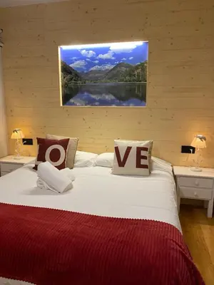 Cama o camas de una habitación en Apartaments Alta Muntanya
