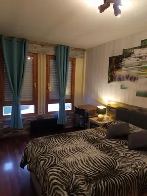 Cama o camas de una habitación en Apartamento de montaña 