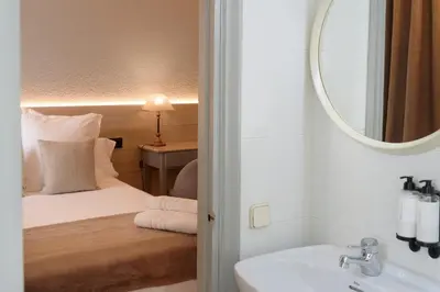 Cama o camas de una habitación en Hotel Anglada