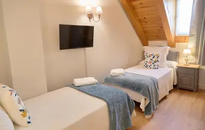 Cama o camas de una habitación en Hotel Anglada