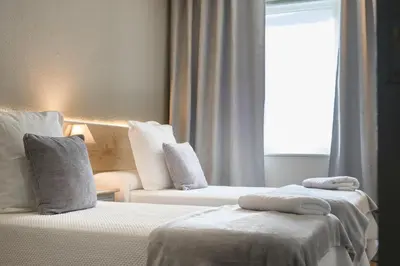 Cama o camas de una habitación en Hotel Anglada