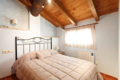 Cama o camas de una habitación en Apartamentos La Pastora