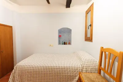 Cama o camas de una habitación en Apartamentos La Pastora