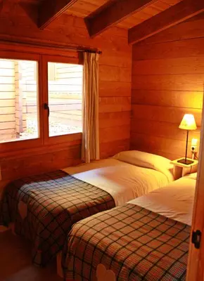 Cama o camas de una habitación en Bungalows Nou Camping