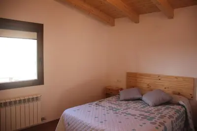 Cama o camas de una habitación en Casa Mestres
