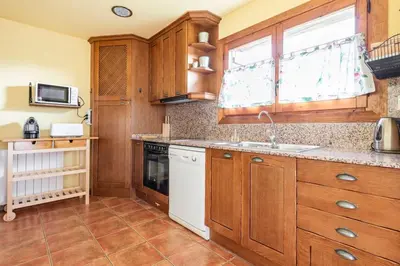 Una cocina o zona de cocina en La Voz del Silencio