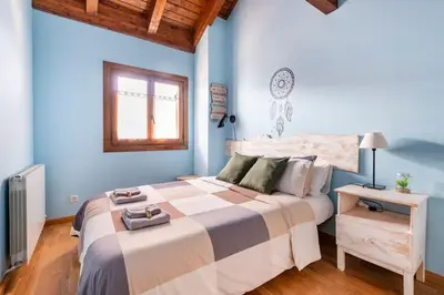 Cama o camas de una habitación en La Voz del Silencio