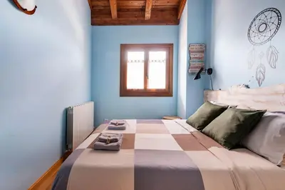 Cama o camas de una habitación en La Voz del Silencio