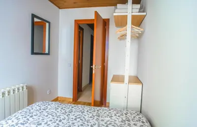 Cama o camas de una habitación en Ca' la Júlia Vall de Boi