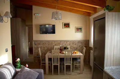 Una televisión o centro de entretenimiento en casa oliva la bodegueta