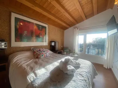 Cama o camas de una habitación en Agrovillaujue apartamentos rurales
