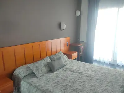 Cama o camas de una habitación en Hotel El Salt