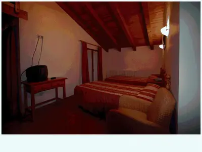 Cama o camas de una habitación en Hotel Can Mestre