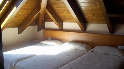 Cama o camas de una habitación en Hostal Pernalle